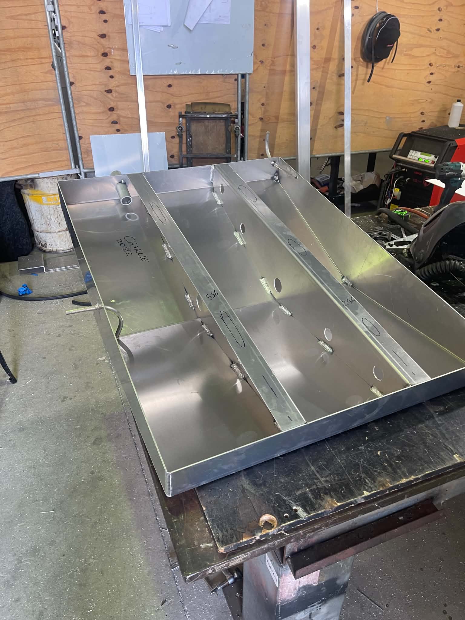 Aluminium boat hull on fabrication stand