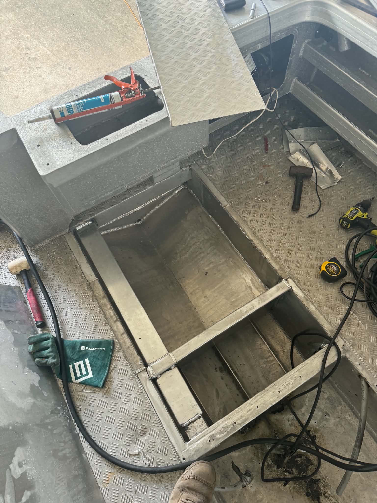 Boat interior with welded compartments